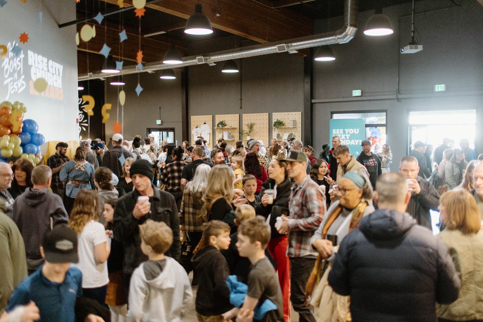 The Rise family gathering for the church’s twelfth anniversary